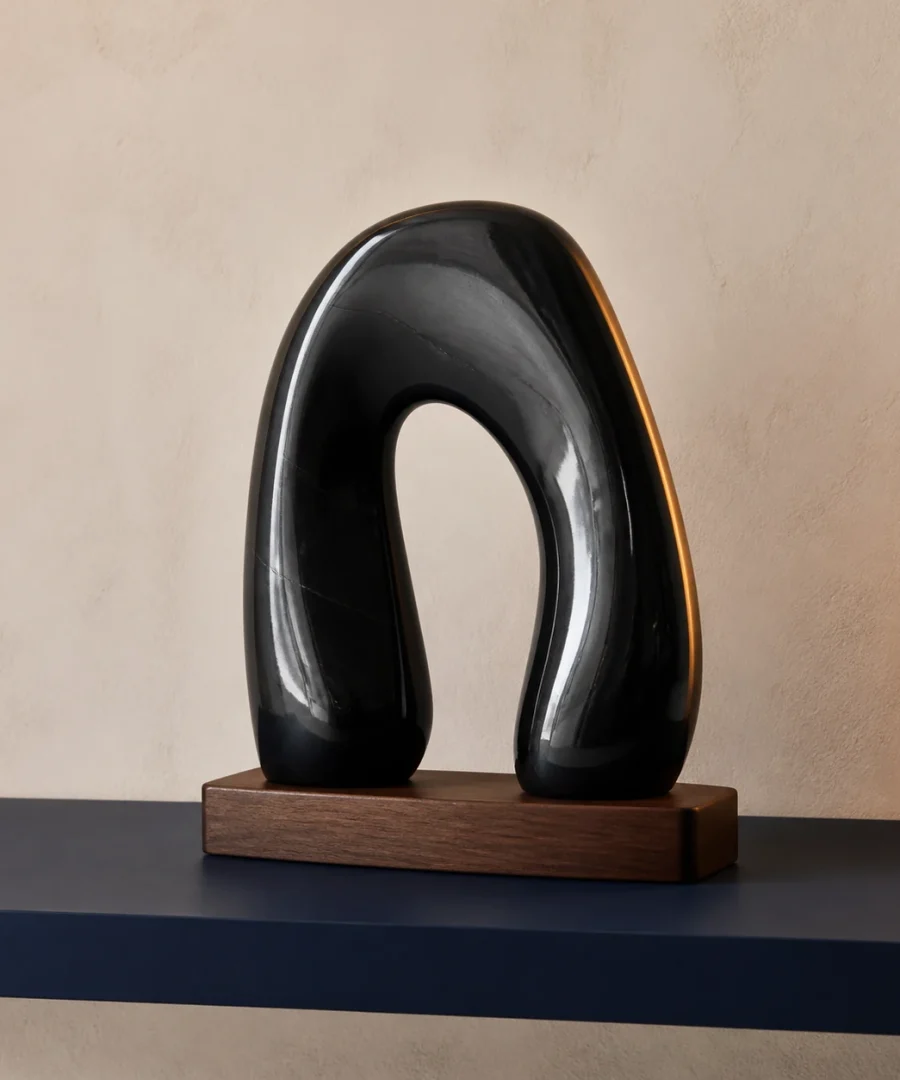 Minimal obsidian arch for a shelf or desk
